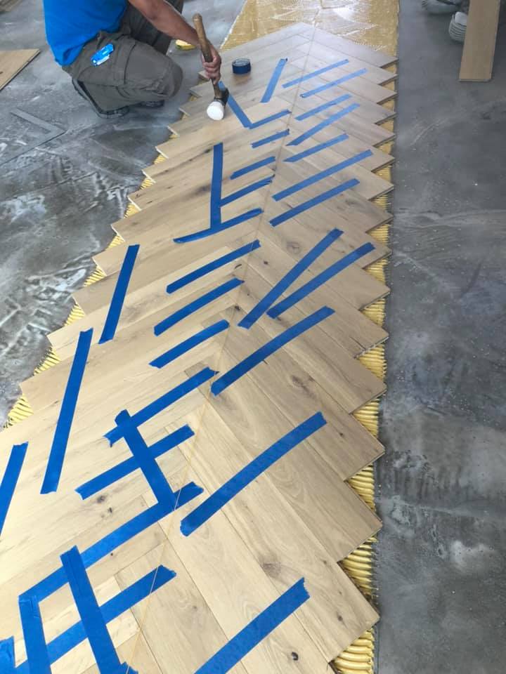 Refinished hardwood — warm stain with satin finish