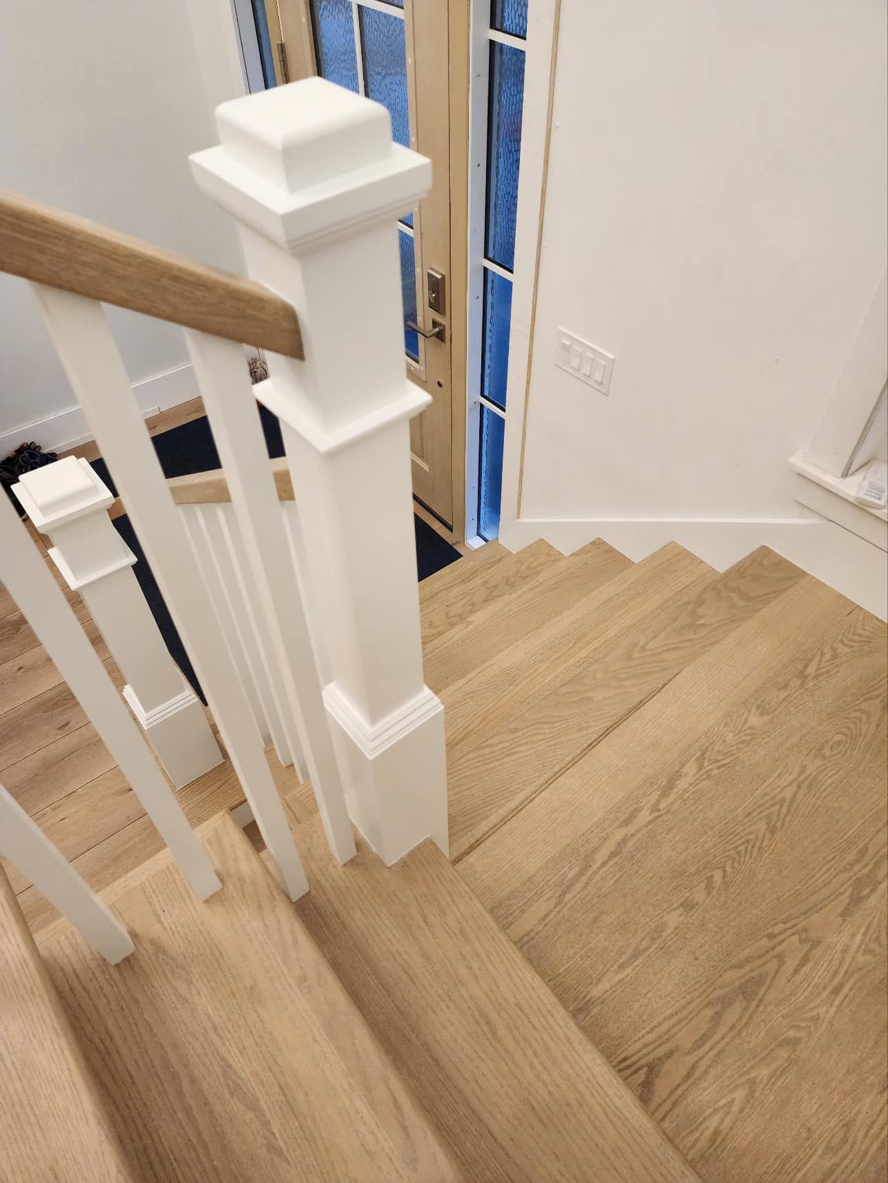 Luxury vinyl plank — modern grey tones in open floor plan