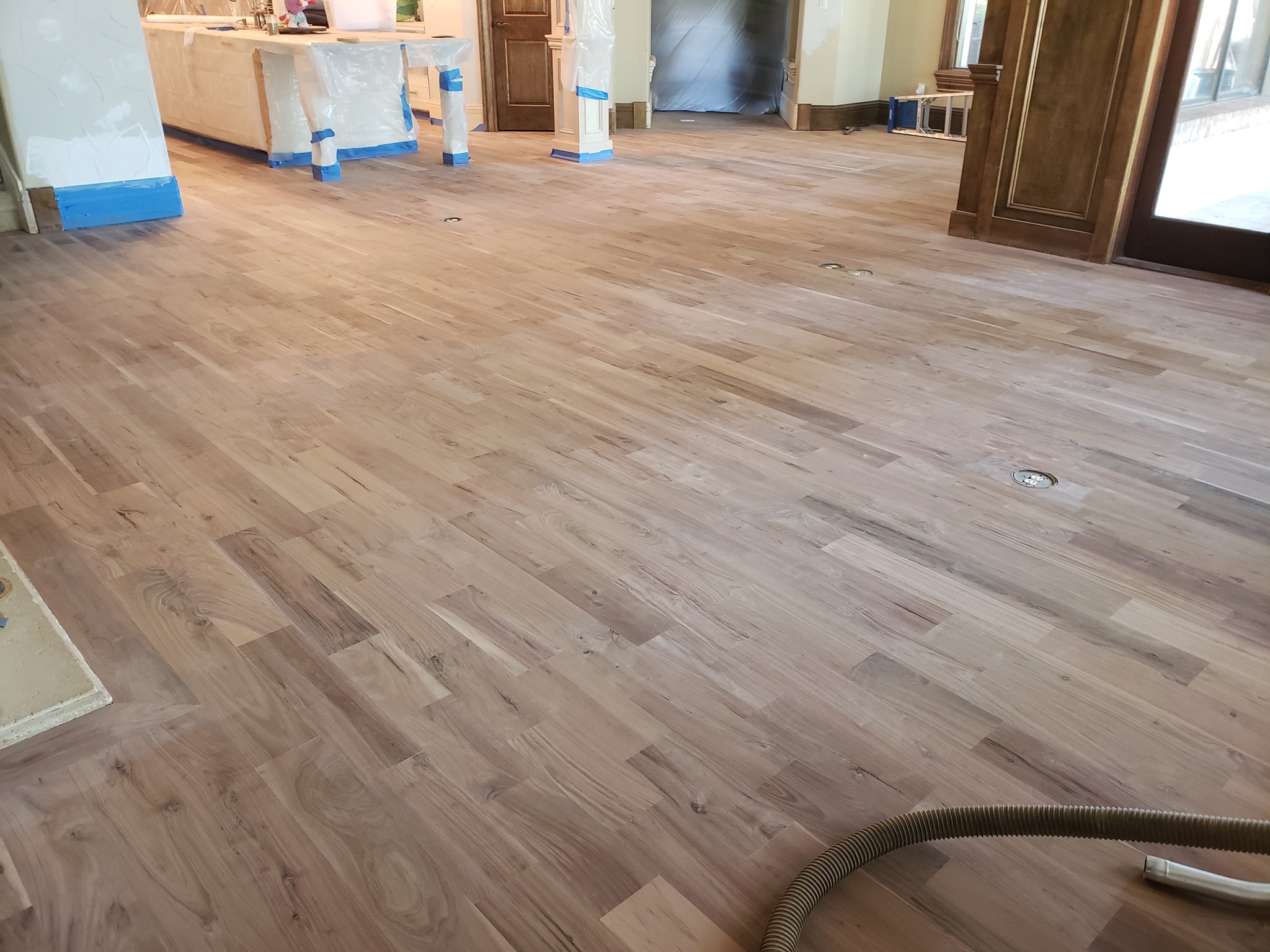Hardwood flooring — bedroom installation with clean finish