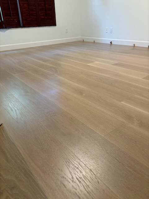 Luxury vinyl plank installation — clean modern finish