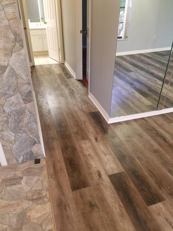 Flooring installation — seamless room transitions